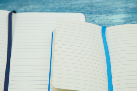 education concept on blue wooden backgroundの写真素材