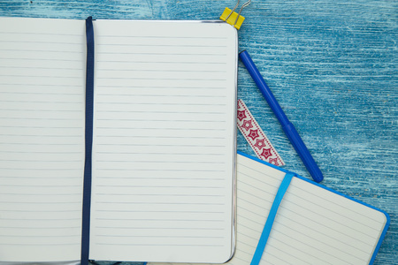 education concept on blue wooden backgroundの写真素材