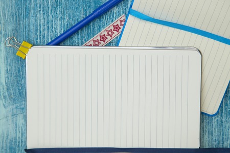 education concept on blue wooden backgroundの写真素材