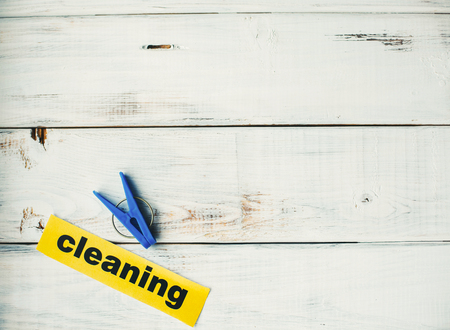 Cleaning inscription and a clothes brushの写真素材