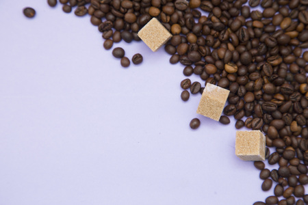 Coffee with sweets on light purple backgroundの写真素材