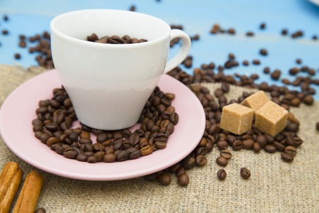 Coffee with sweets on a blue wooden backgroundの写真素材