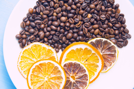 Coffee with sweets on a blue wooden backgroundの写真素材