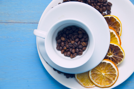 Coffee with sweets on a blue wooden backgroundの写真素材