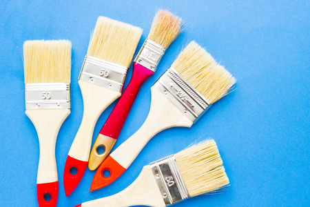 House renovation concept, paint cans and brushesの写真素材