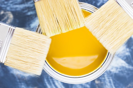 House renovation concept, paint cans and brushesの写真素材