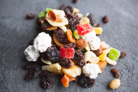 Healthy Breakfast, Sport, Fitness, Weight Loss, Diet Concept. A bunch of muesli with nuts and dry...