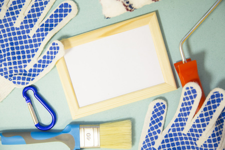 Repair modern tools around a frame board on blue background, top view, copy spaceの写真素材