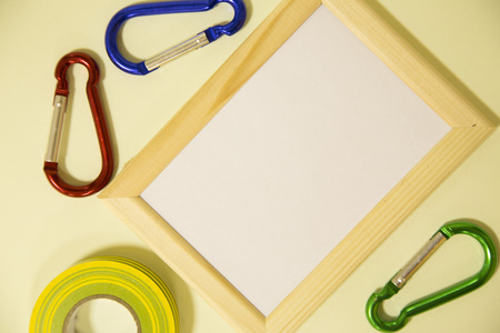 Repair modern tools around a frame board on yellow background, top view, copy spaceの写真素材