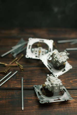 Repair modern tools on dark wooden background, top view, copy spaceの写真素材