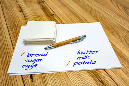 Shopping list at the grocery store the inscription on paper