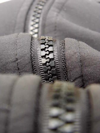 A zipper of a jacket close-up