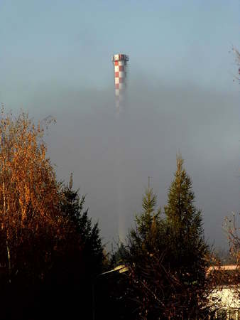 Chimney shrouded in the fog
