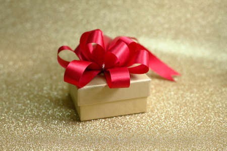 Red ribbon and bow On White gift box is mounted in festivals such as Christmas and New Year.