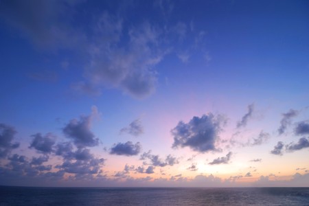 Blue sky with white clouds in the sunset time baseの写真素材
