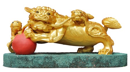 Golden lion statue form. The guard in a Chinese templeの写真素材