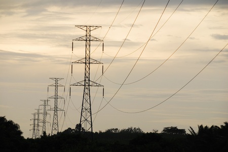 High-voltage towers. The steel pole and specify a large high voltage transmission.の写真素材