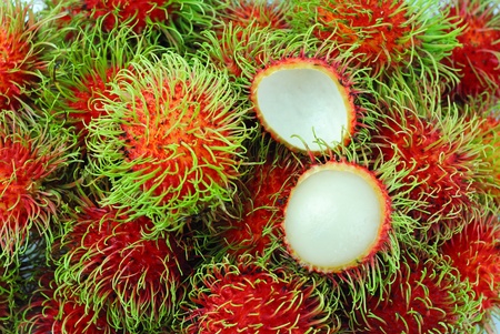 Rambutan is a fruit with sweet red shellの写真素材
