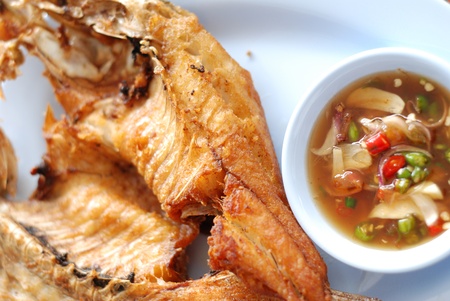 Fried fish is fried. By the hot oil, then put the fish into the pan and fry until cooked. Ready to...