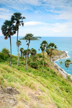 Promthep Cape is a mountain of rock that extends into the sea in Phuket, Thailandの写真素材