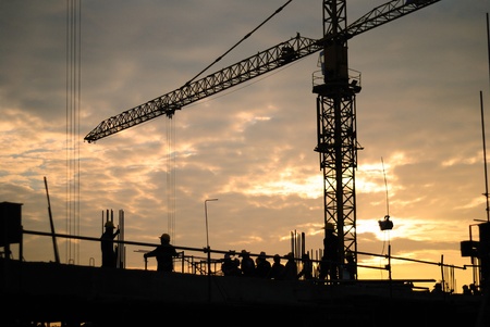 Black silhouette of the building construction is not finished.の写真素材