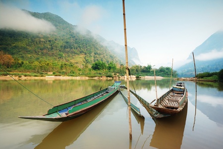 local Long-tailed boat in mekong river ,laos の写真素材