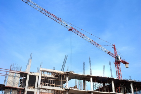 Construction site with crane and building の写真素材