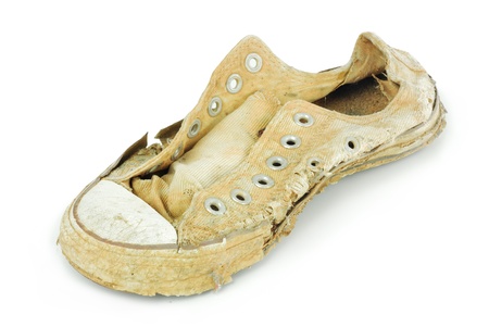 old sneakers on white background. の写真素材