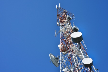 Telecommunication tower with a  sunlight. Used to transmit television signals.