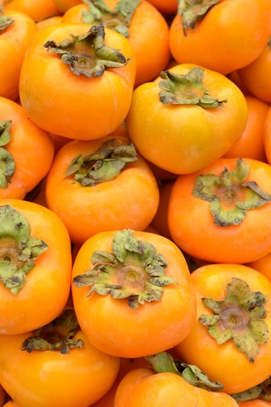 Persimmon fruit at the farmers marketの写真素材