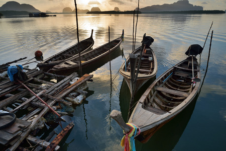 Traditional thai longtail boats at sunset ,thailandの写真素材