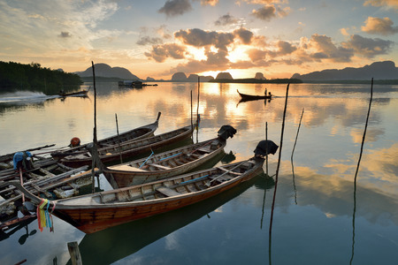 Traditional thai longtail boats at sunset ,thailandのeditorial素材