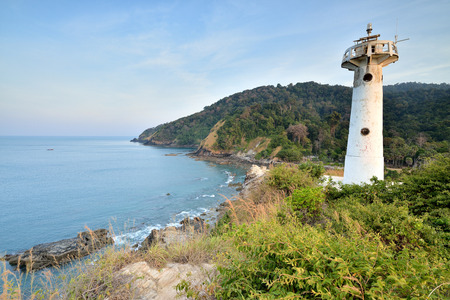 Lighthouse On Cliff sunset in lanta island,thailandの写真素材