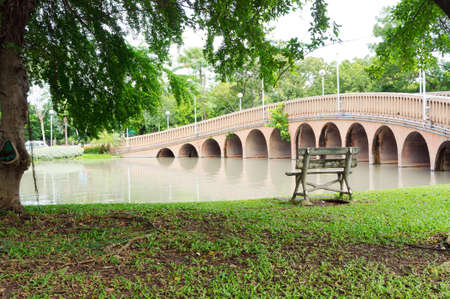 Bridge and stream in Green Garden の写真素材