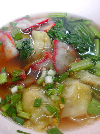 Hot wonton soup with roasted pork Chinese style.の素材
