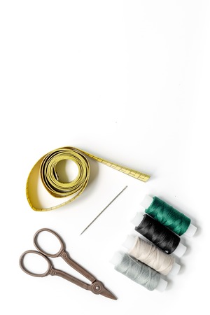 Sewing tools and kit for handmade hobby collection on white background top view mock-upの写真素材