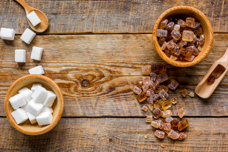sugar cubes in bowls on stone table background top view mockupの写真素材