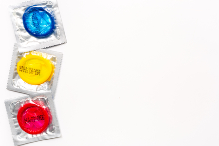 safe sex with condom contraception on white background top view mock upの写真素材