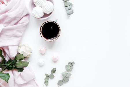 sweet marsh-mallow and flowers on woman white desk background top view mockupの写真素材