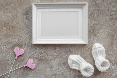 baby shower decoration for birth of child celebration on gray stone background top view mock upの写真素材