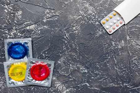 Condoms in package for safe sex on white background top view mock-upの写真素材