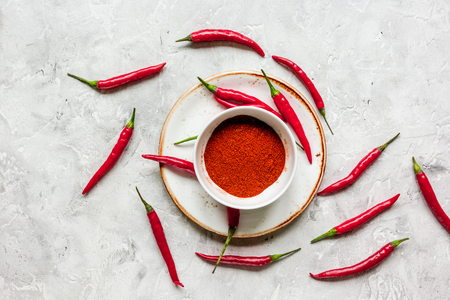 food ingredient red chilli pepper on stone table background top viewの写真素材