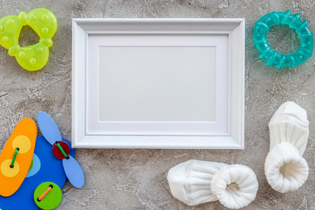 baby shower decoration for birth of child celebration on gray stone background top view mock upの写真素材