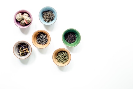 Different kinds of herbal tea on white background top view mockupの写真素材