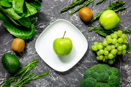 Green fresh food for fitness diet on dark table top viewの写真素材