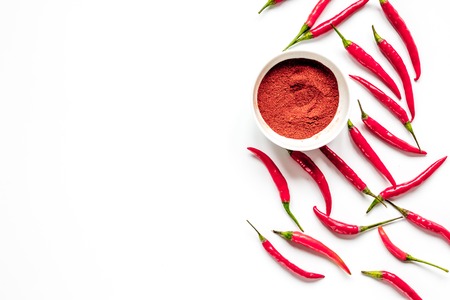 hot food with red chili pepper white table background top view mock-up