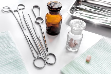 Medical instruments for plastic surgery on white backgrond top view copyspace.の写真素材