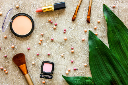 Beauty and fashion with decorative cosmetics for make up on stone woman table background top view patternの写真素材