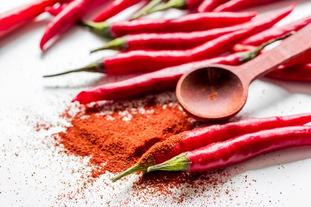 red hot chili pepper design on white kitchen desk background close upの写真素材
