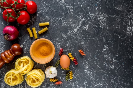 Italian food concept pasta ingredients on grey stone desk background top view copyspaceの写真素材